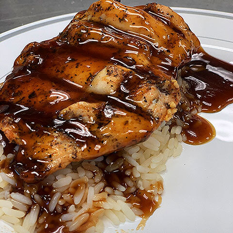 Bourbon chicken over white rice